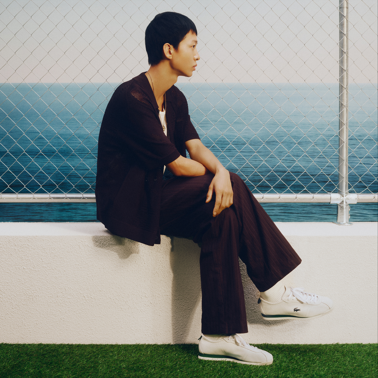 shop men's banner - leg down shot showcasing the leather Carnaby sneaker and 